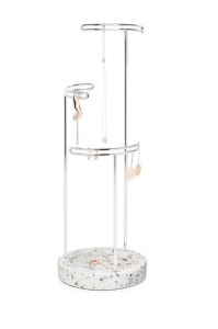 3 pairs of earrings and a necklace are neatly stores on a three-tiered jewellery holder, where the terrazzo base also acts as a catch-all dish.