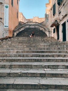 Sitting on steps in Dubrovnik.